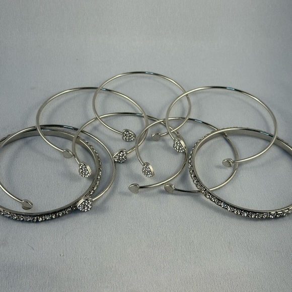 Set of eight silver tone bangles with clear rhinestones - Picture 4 of 4